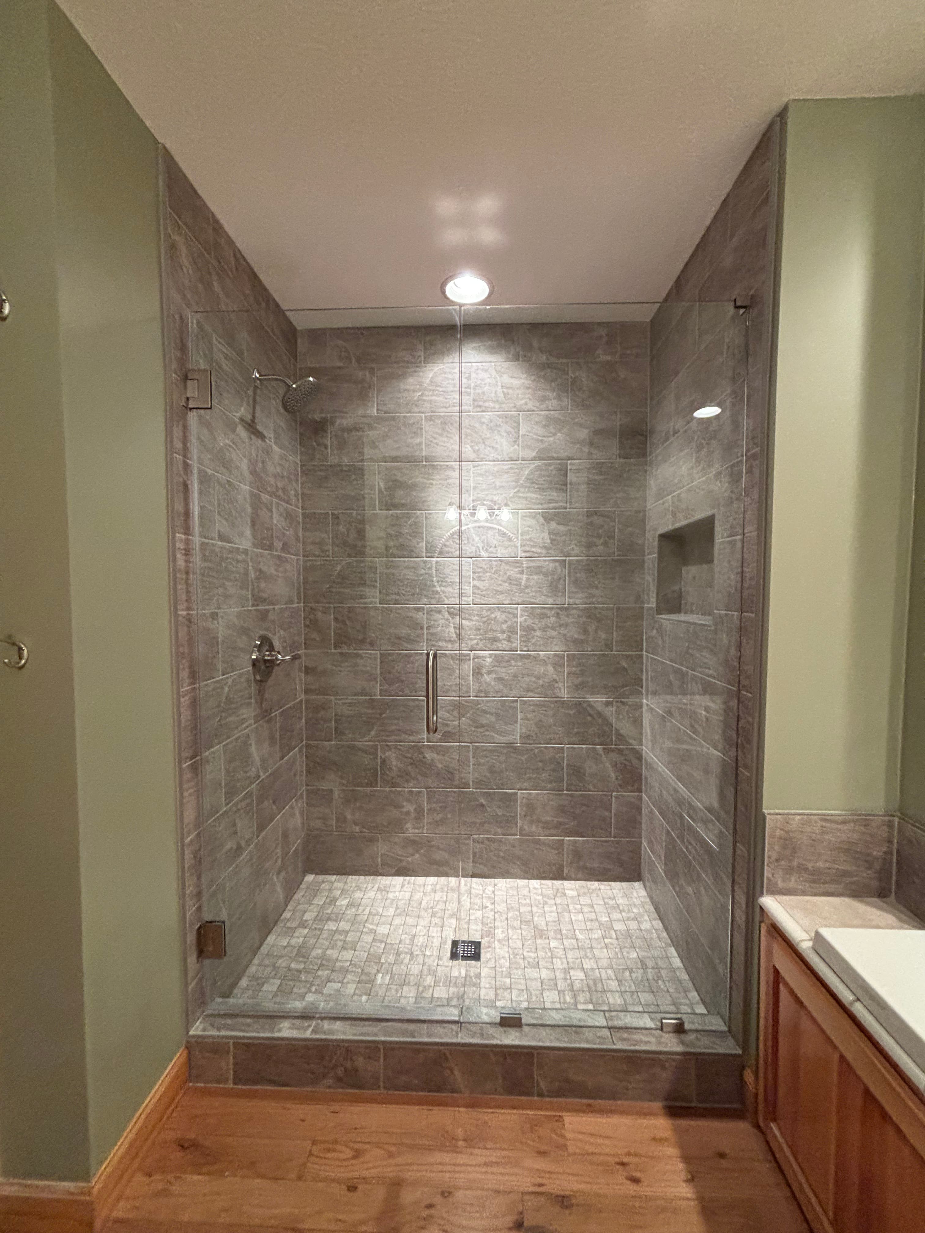 Artisanal Stone Tile Shower Enclosure